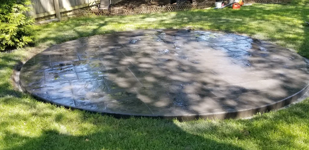 round stamped patio in backyard springfield illinois