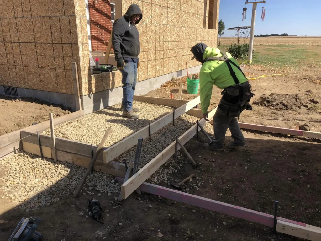 installation of a concrete walkway and steps for a new construction springfield il