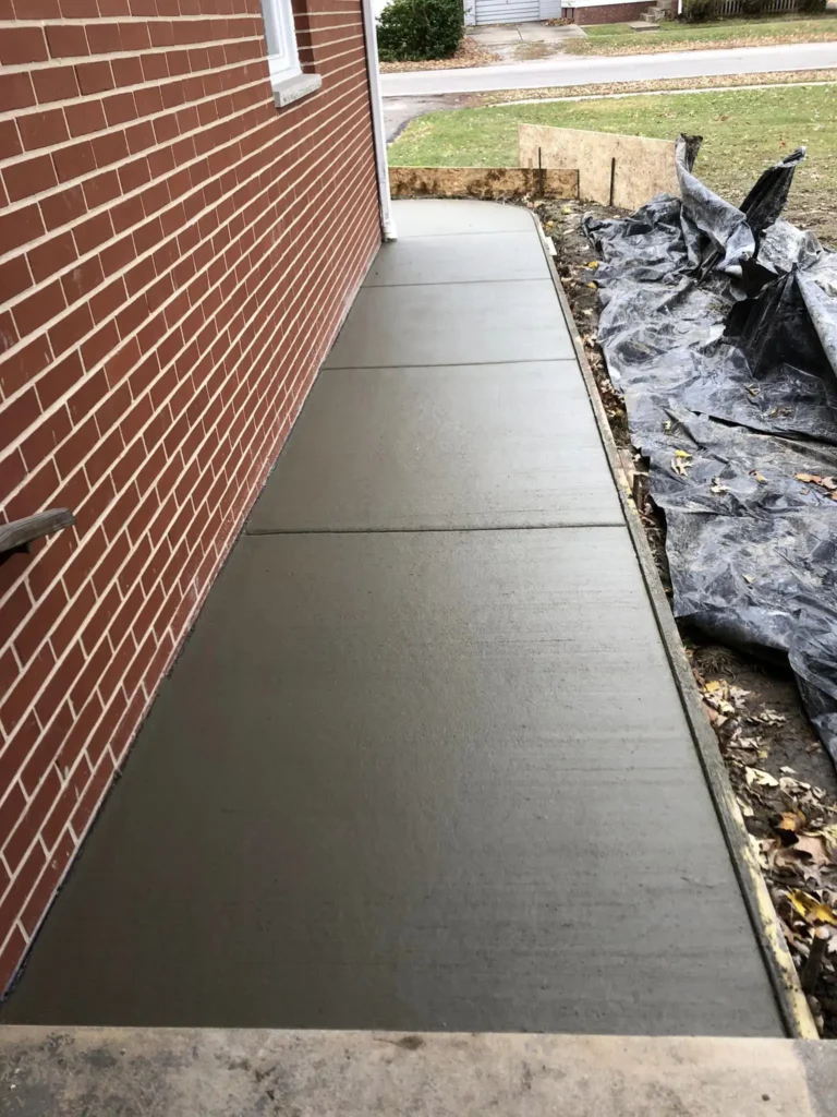 paved wet concrete residential walkway springfield illinois